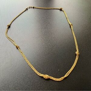 Vintage Monet gold mid-length knot chain necklace